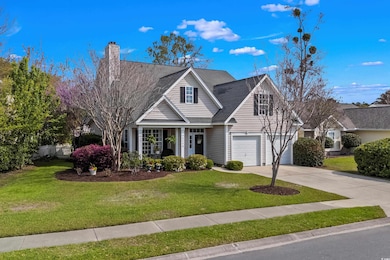 View of front of property featuring a front yard, 