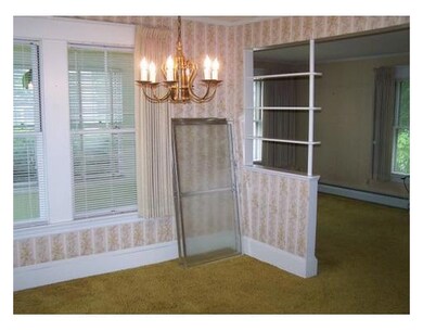 Dining Room. Hardwood floors beneath...