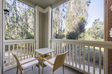 Screened porch with wooded view