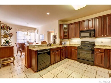 Eat in tile Kitchen with amenities, including Gran