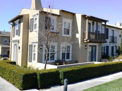 View of the (end unit) home, private patio and sec