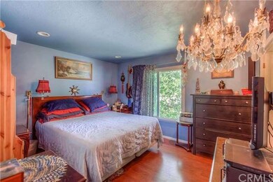 Master bedroom with recessed lighting, pretty gree