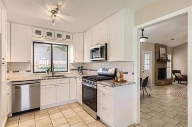Kitchen featuring appliances with stainless steel