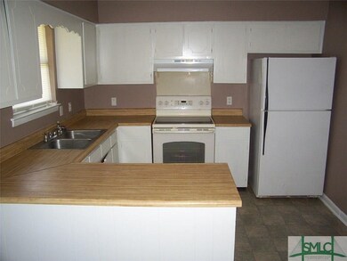 Kitchen - A view from the Breakfast Area.  All app