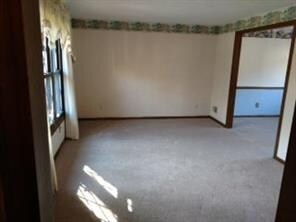 Large Living Room with nice windows for Natural Li