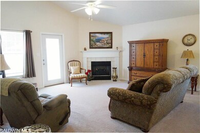 Living room w/electric log fireplace