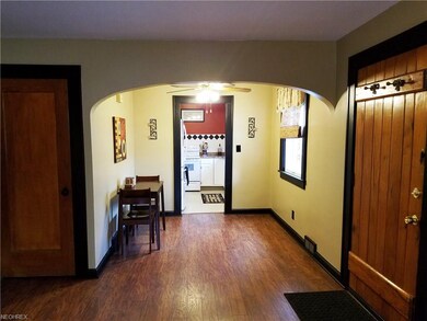 Entryway with oak floors.