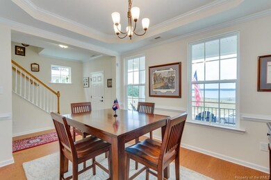 Formal dining area with water views.