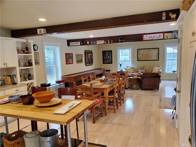Open Floor Plan with Steel Beams on ceiling.  Beau