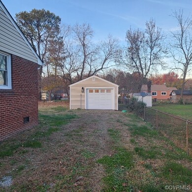 View of yard featuring a garage