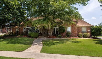 Front of home shows mature trees and sits on an in