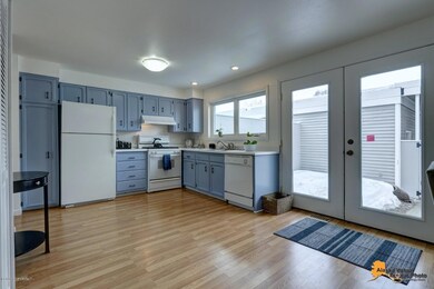 Door from courtyard, spacious kitchen