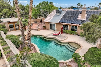 View of swimming pool featuring a patio, a fenced