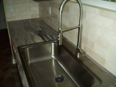 NEW STAINLESS SINK WITH BEAUTIFUL FIXTURE!