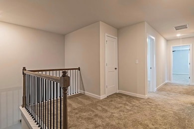 Hall featuring carpet