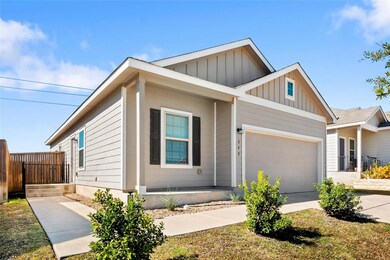 View of front of property with board and batten s