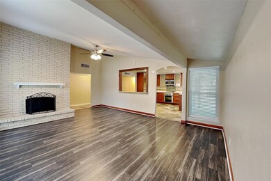 Unfurnished living room featuring vaulted ceiling 