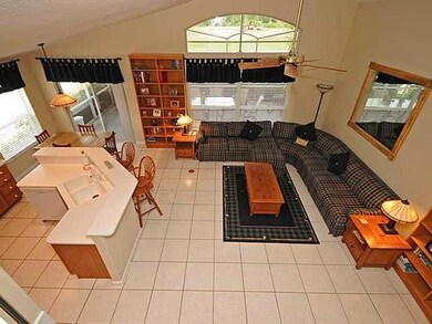 Exterior Front. FAmily room with bookcases that may stay with the home.  High ceilings.