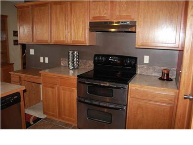 New range/oven is glass top with double oven! Home