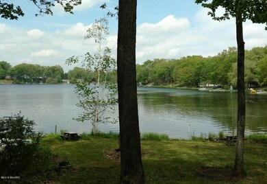 319 Harbison Dr, Bitely, MI 49309 - photo 3