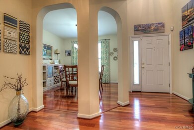 Double archways frame the formal dining room