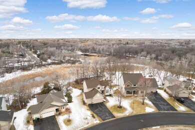 Backing up to wetlands means your yard feels even larger than the .7 acre lot this home is situated on.