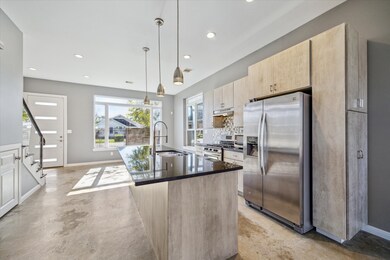 This kitchen offers a sleek modern design with amp