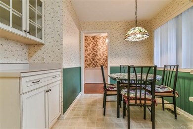 Extra cabinetry off breakfast room which opens to 