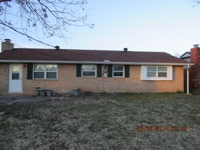 Back house features large open patio.