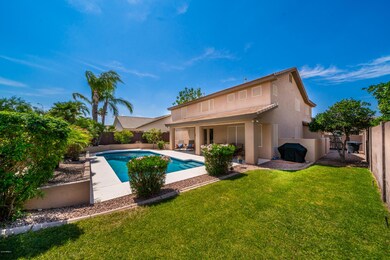 Spacious backyard w grass