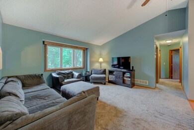 Living room is off of informal dining area.