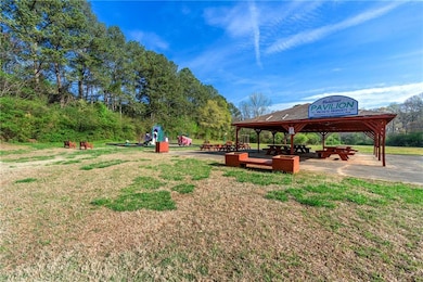 Surrounding community featuring a gazebo and a yard