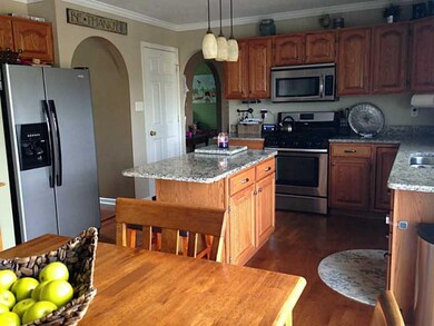 Kitchen. Crown molding added to kitchen and living room.