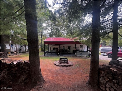 View of yard featuring a fire pit