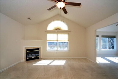 THE LIVING ROOM IS SPACIOUS AND BRIGHT WITH CATHED