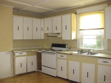 16'x12.7' Large Eat-In Kitchen full of cabinets! Real wood parquet and coffered ceiling!