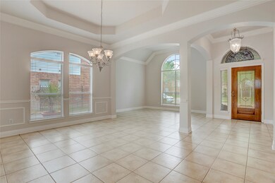 Family room with many windows, open plan with acce