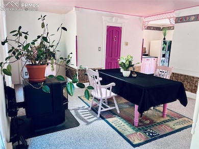 View of carpeted dining area