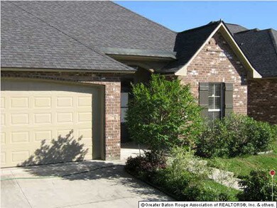 GARAGE, ADDED PARKING ON THE SIDE. All parking TO 