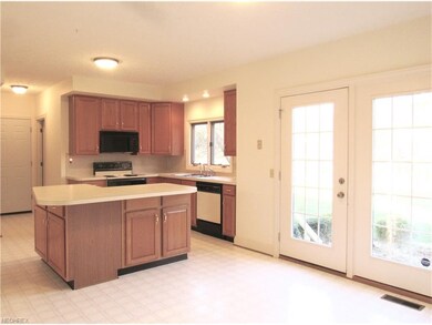 The kitchen has been freshly painted.