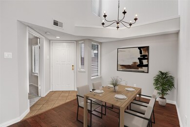 Virtually staged dining room is so welcoming!