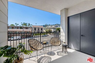 Covered balcony off living room (and storage room!