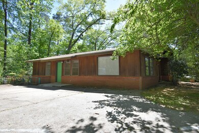 LEFT SIDE OF HOUSE WITH PARKING PAD