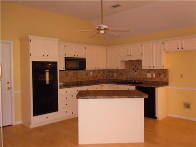 Updated Kitchen with Island offering plenty of roo