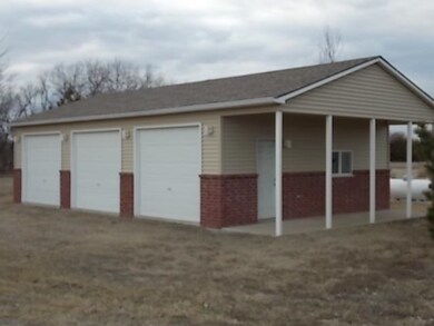 This detached garage has 3 bays.  Owner was using 