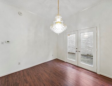 Dining room features a chandelier and access to th