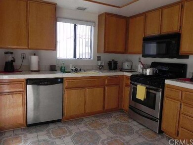 Bright open kitchen with lots of cabinets.  Large 