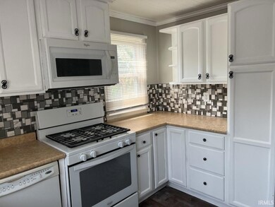 Kitchen offers plenty of cupboard and pantry space