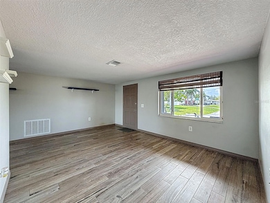 NOTICE THE BARN WOOD LOOK TILE FLOORING