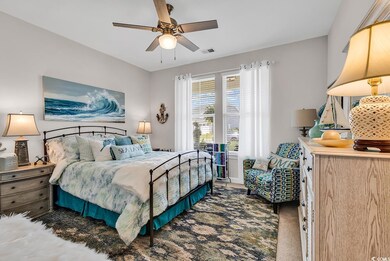Carpeted bedroom featuring visible vents and ceili